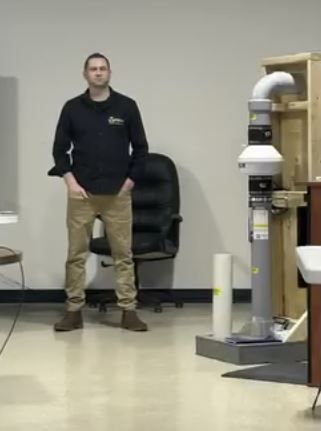 Certified radon technician with equipment